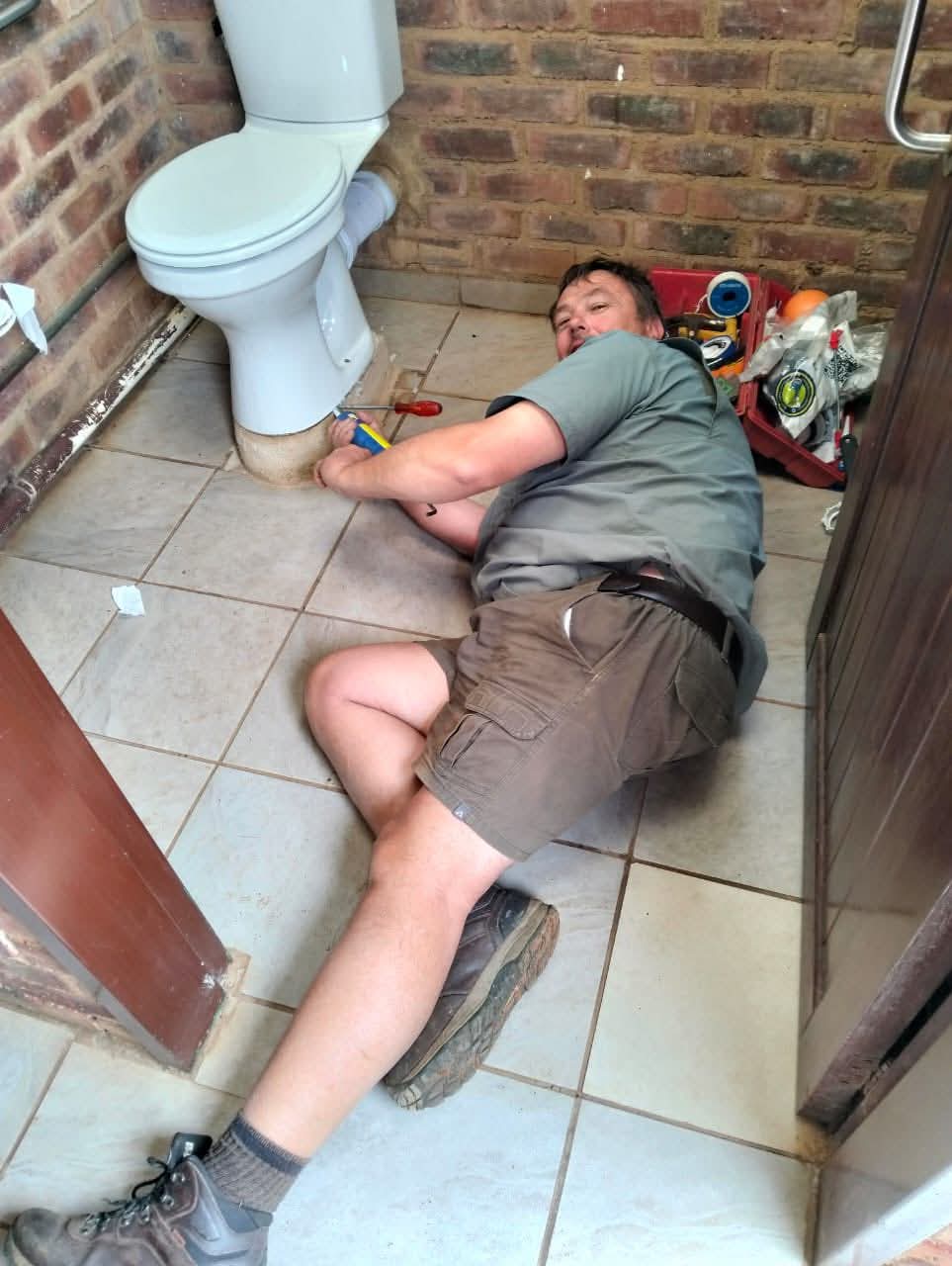 Pieter personally completing a plumbing repair